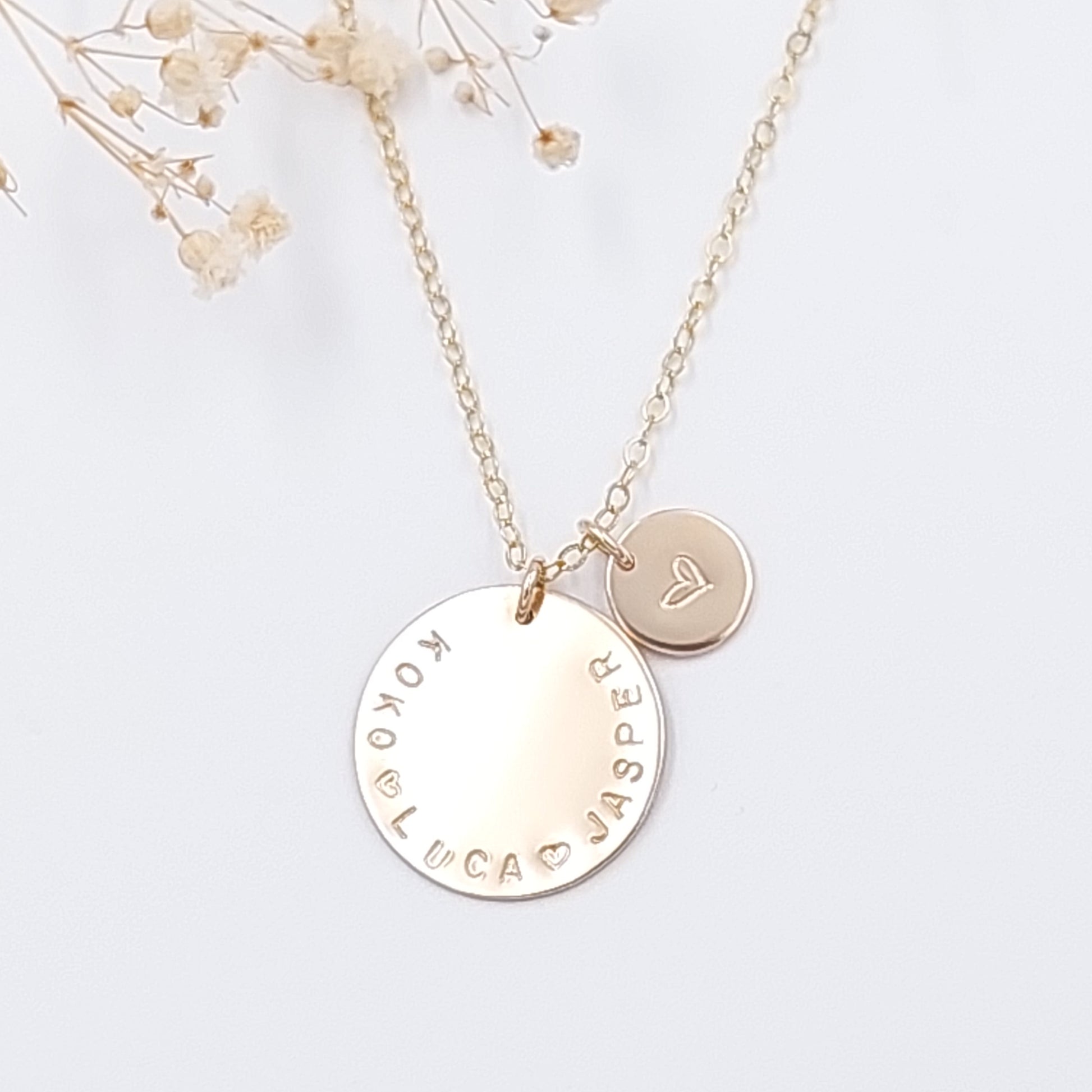 A large goldfilled disc with a smaller disc on a dainty gold filled chain. Personalised necklace, handstamped jewellery, nzmade, personalised jewellery, mothers gift, grandmother gift, NZ Jewellery