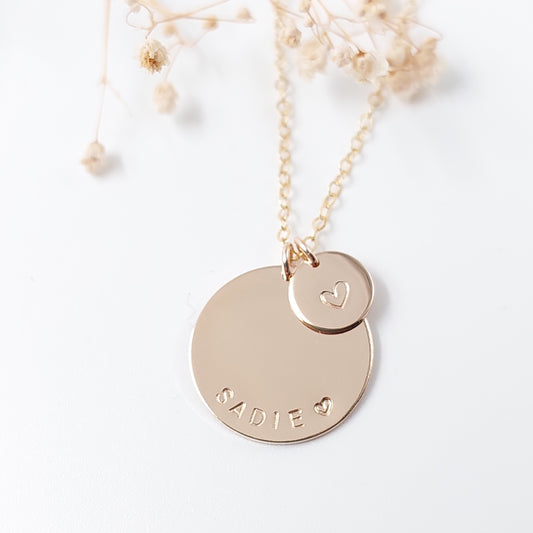 A large goldfilled disc with a smaller disc on a dainty gold filled chain. Personalised necklace, handstamped jewellery, nzmade, personalised jewellery, mothers gift, grandmother gift, NZ Jewellery