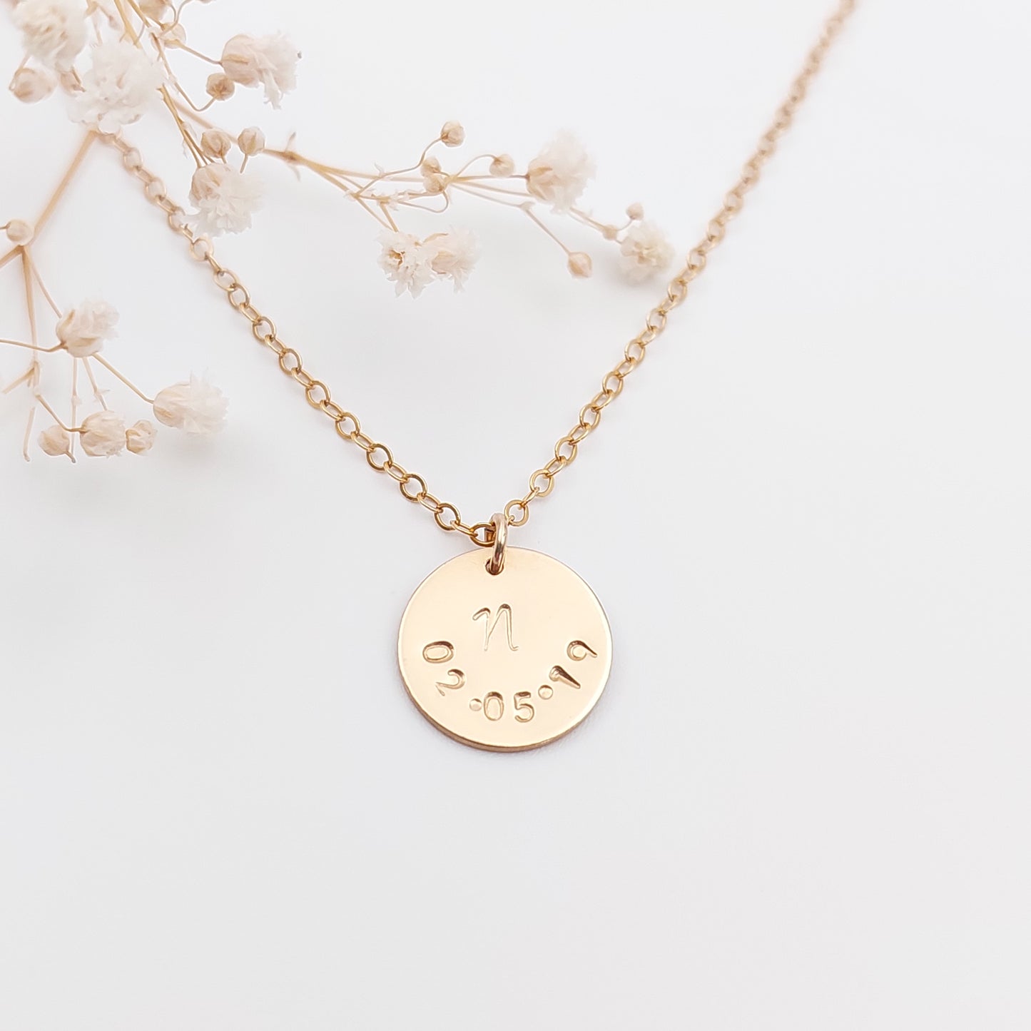 personalised necklace with and initial and date hand stamped onto it. Personalised jewellery NZ. Sterling Silver, Gold fill and Rose Gold Fill. Personalised gift nz