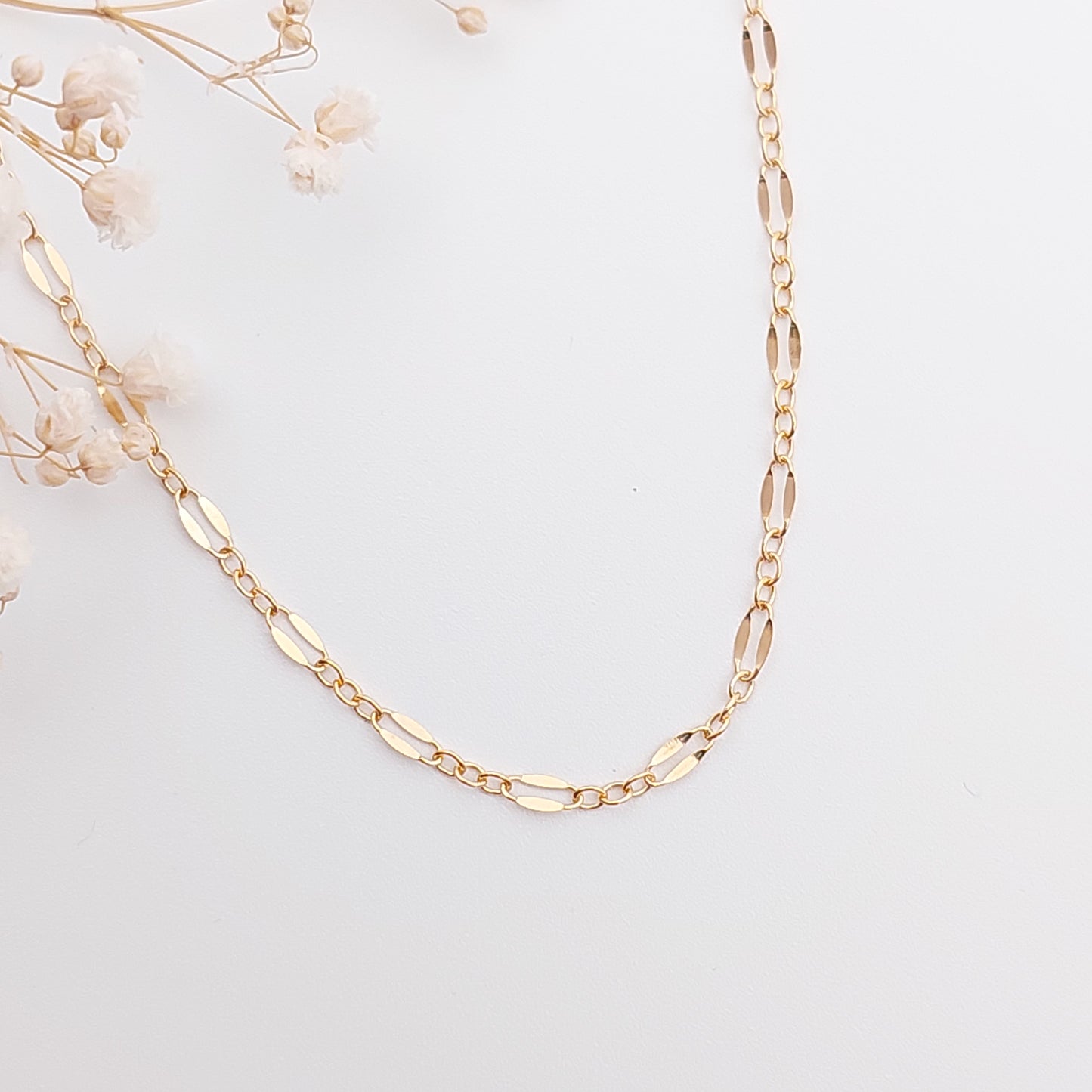 Beautiful sparkly chain consisting of long and short links. Lace like chain available is Sterling Silver, 14k Gold Filled and 14K Rose Gold Filled