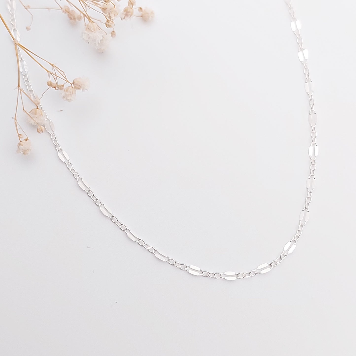 Beautiful sparkly chain consisting of long and short links. Lace like chain available is Sterling Silver, 14k Gold Filled and 14K Rose Gold Filled