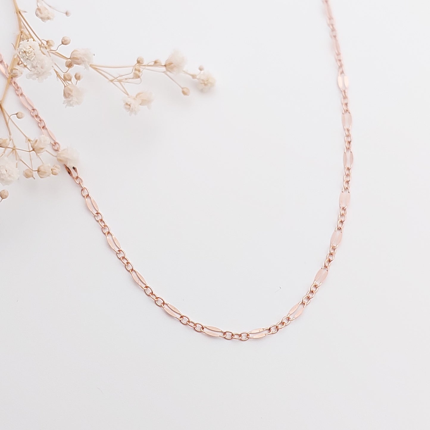 Beautiful sparkly chain consisting of long and short links. Lace like chain available is Sterling Silver, 14k Gold Filled and 14K Rose Gold Filled