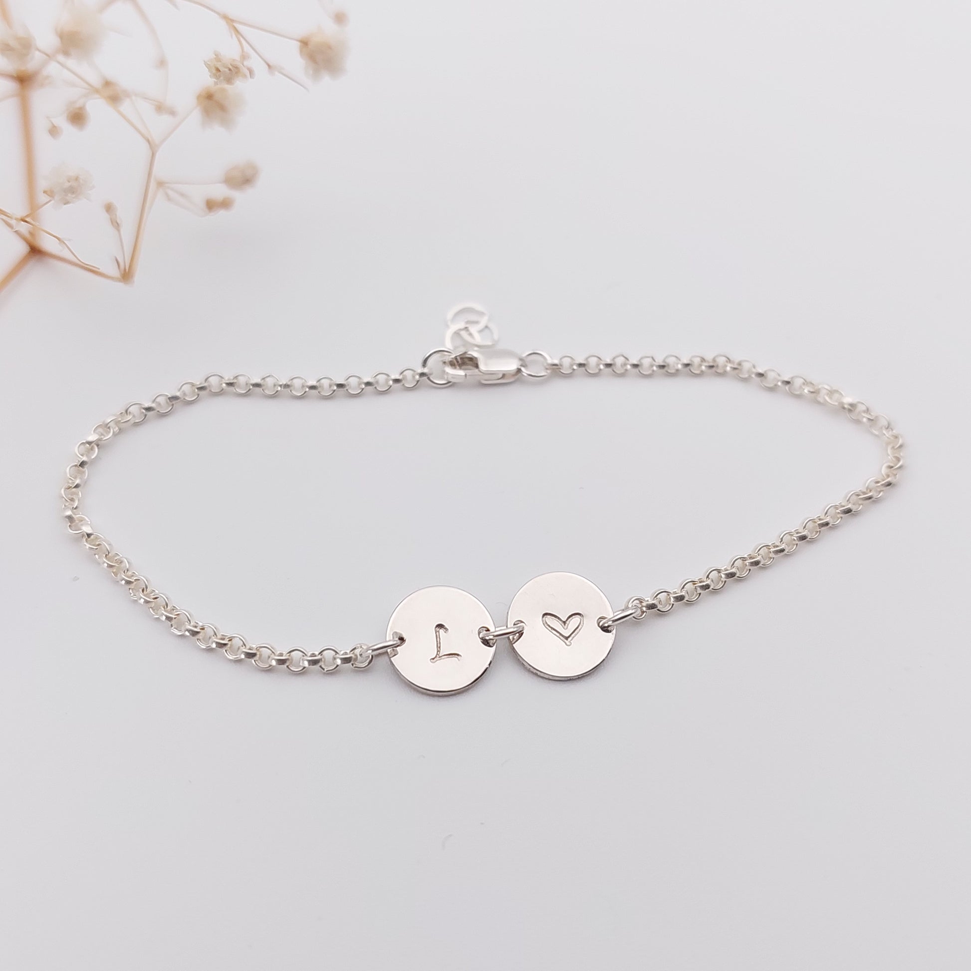 Personalised hand stamped bracelet. Personalised Jewellery, hand stamped jewellery. Double disc bracelet with an initial and a heart hand stamped onto it. Available in Sterling Silver, 14k Gold Filled and 14k Rose Gold Filled