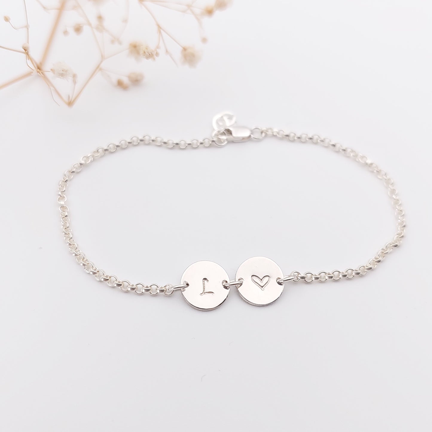 Personalised hand stamped bracelet. Personalised Jewellery, hand stamped jewellery. Double disc bracelet with an initial and a heart hand stamped onto it. Available in Sterling Silver, 14k Gold Filled and 14k Rose Gold Filled