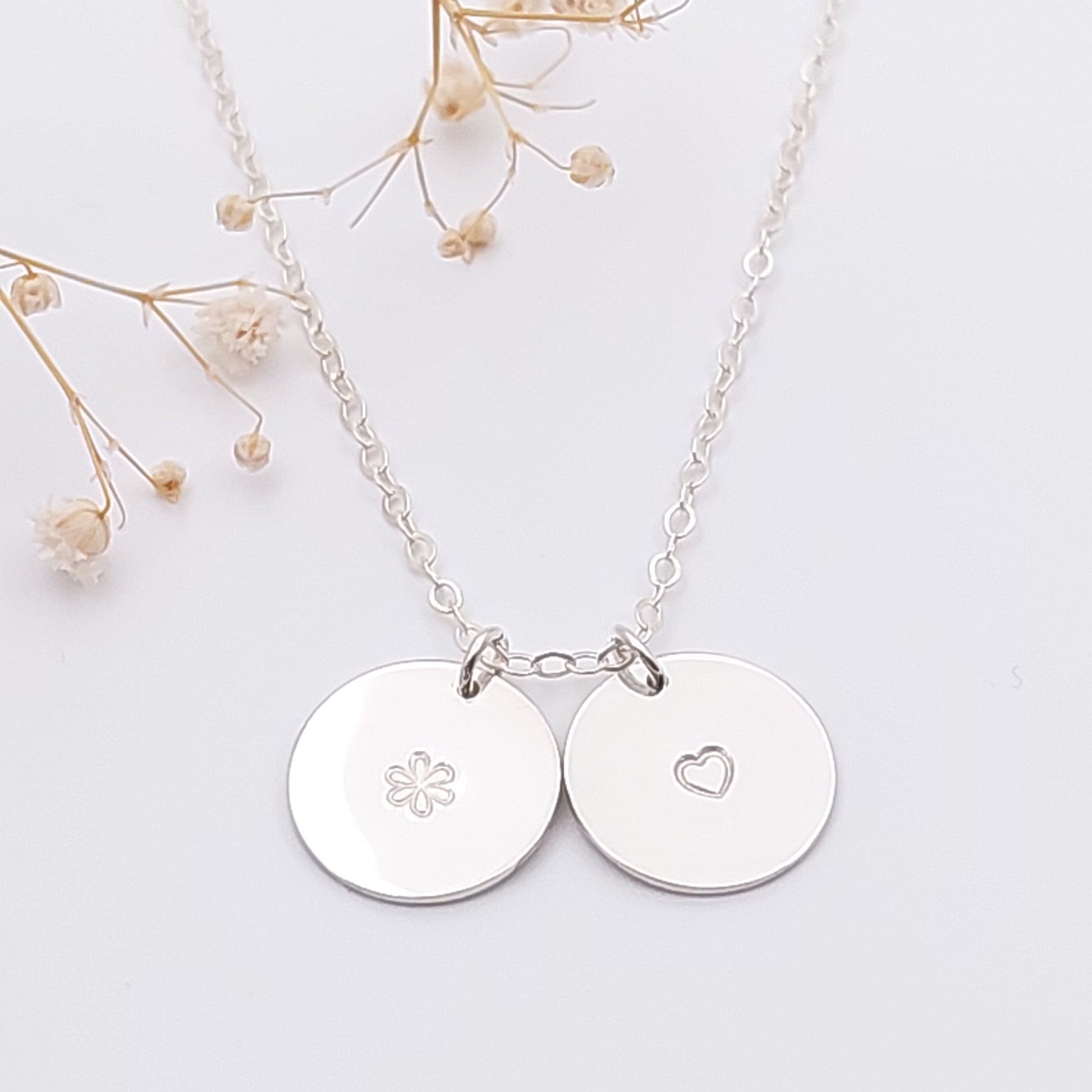 Personalised jewellery. Personalised hand stamped necklace with a flower and heart onto two 13mm discs. Initial necklace. Hand stamped jewellery. Sterling Silver and 14k Gold Filled. Made in New Zealand