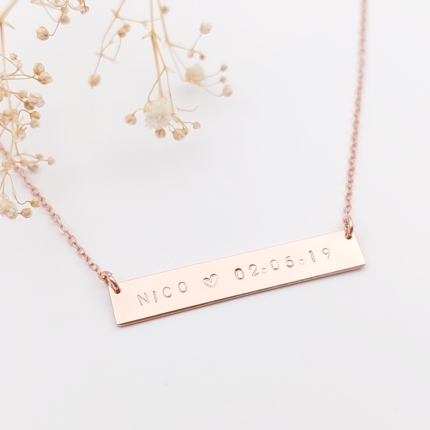 Personalised necklace with a name and date hand stamped onto it. Sterling Silver, gold filled. Personalised Hand Stamped jewellery, made in New Zealand nz. Personalised Bar necklace, name neclace, date necklace, initial necklace