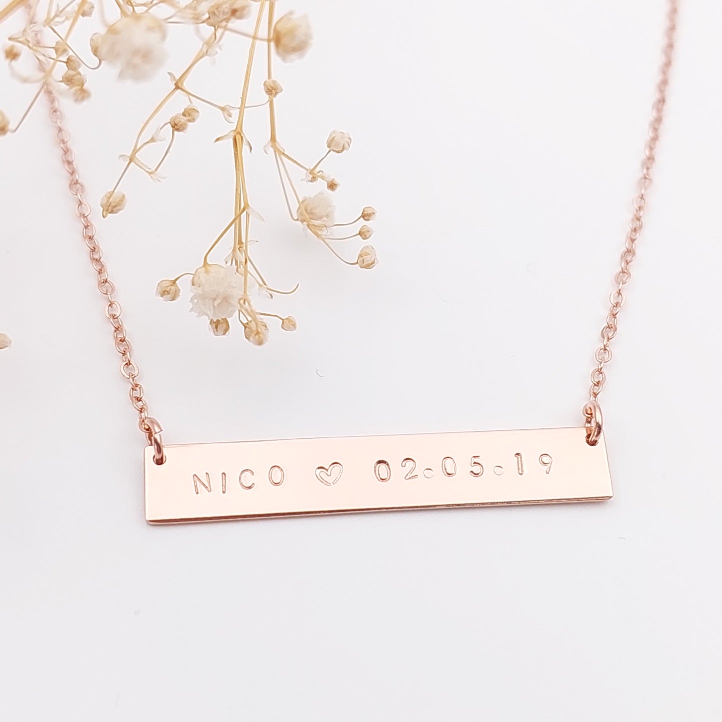 Personalised necklace with a name and date hand stamped onto it. Sterling Silver, gold filled. Personalised Hand Stamped jewellery, made in New Zealand nz. Personalised Bar necklace, name neclace, date necklace, initial necklace