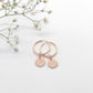 Our Disc Hoops in 14K Rose Gold Filled. Both have a whimsy heart stamped on them. Personalised Earrings, Hand stamped jewellery. Personalised Jewellery